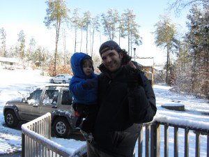 Sam experiencing his first snow play during our 2013 family retreat at Lake Anna