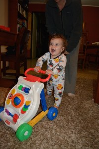 Benjamin is growing like a weed and eager to start walking.